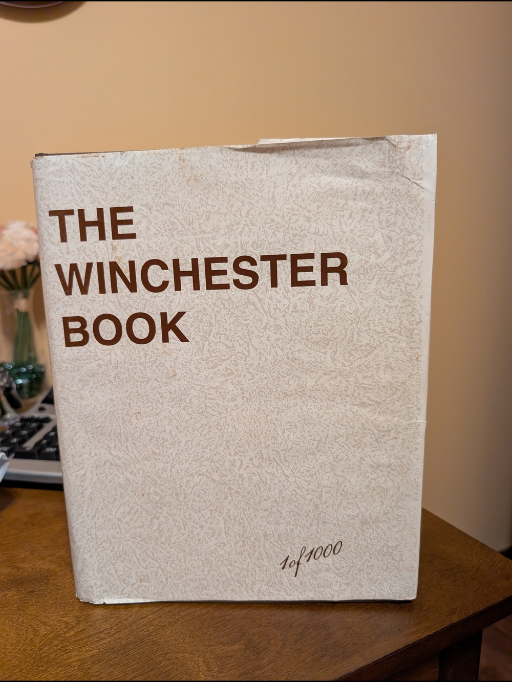 The Winchester Book — White Cover with Brown Text